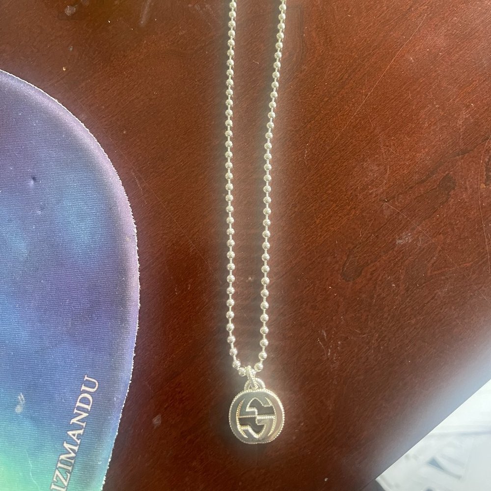 GUCCI Interlocking G pendant/necklace